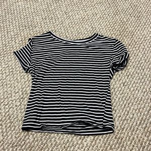 Black and white striped crop top. It shows large, but it fits more like a small.